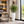 White Riser Planter – white textured riser planter with foliage in an office