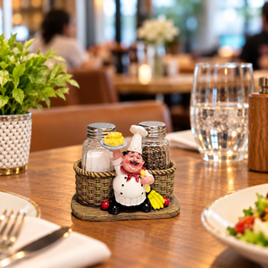 Chef salt and pepper shaker set in a basket-style decorative holder on a dining table