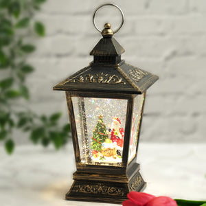 Christmas Snow Globe Lantern with Lights and Music, Santa with Christmas Tree, and Fake Snow - Great for Decoration and as a Gift by Sona Casa