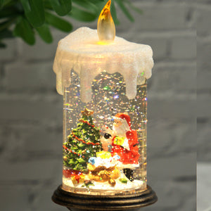 Holiday decorations, beautiful christmas snowglobe candle with lights and music, santa with reindeers by Sona Casa
