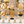 Gold abstract sculpture with close-up views of the metal design and black base